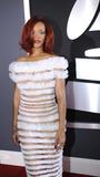 http://img219.imagevenue.com/loc792/th_55526_Rihanna_53rdGrammyAwards_130211_013_122_792lo.jpg