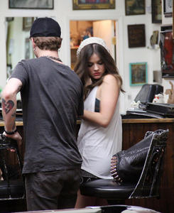 http://img219.imagevenue.com/loc794/th_586986222_LucyHale_ShamrockTattooCandids_September9_2012_6_122_794lo.jpg